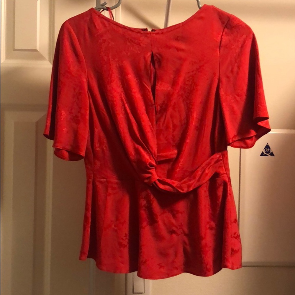 Red floral blouse